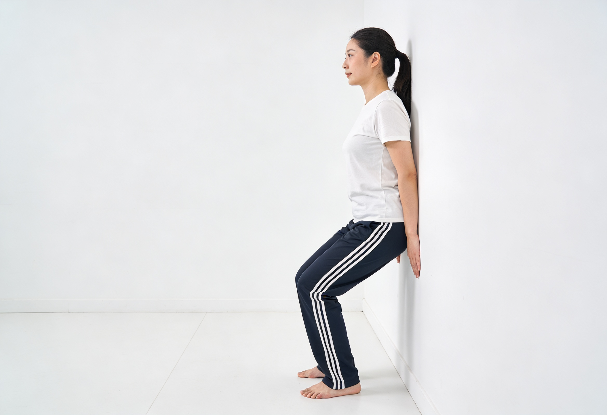 Wall-Supported Mini Squats Exercise